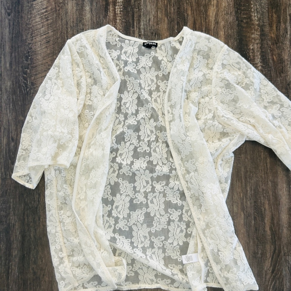 Express Ivory Floral Lace jacket
Great for an outfit or as a beach cover up!